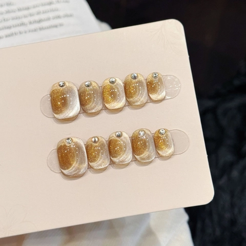 Champagne Goud Kattenoog Press On Nails Handgemaakte Korte Ronde Kunstnagels Strass Accent Dames Dagelijks Elegant Luxe