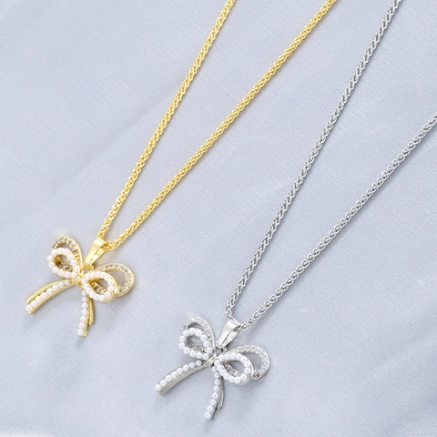 Squisita Collana a Fiocco in Ottone con Perla Artificiale per Donna Stile Ins di Nicchia Catena per Clavicola con Strass Gioielli Regalo