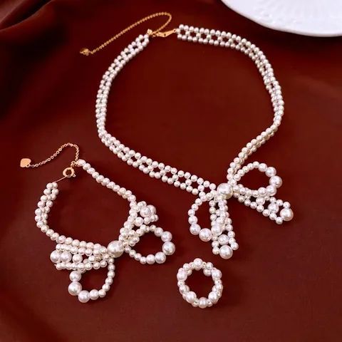 Collana Bracciale E Anello Di Künstliche Perle Con Fiocco Stile Retrò Francese Elegante Imitazione Perla Artificial Bianca Rame Gioielli Donna