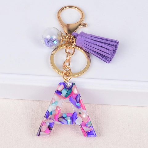 Fashion Multicolor Crushed Stone Resin Initial Letter Keychain With Purple Tassel And Star Sequin Ball Gold Pendant