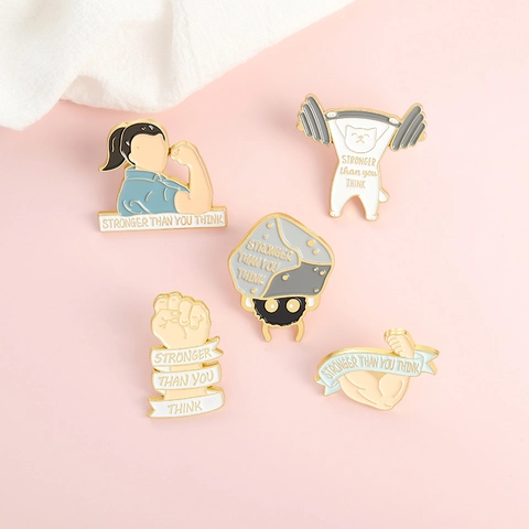 Pines De Esmalte Motivadores Stronger Than You Think Broches De Aleación Para Mochilas Solapa Dibujos Animados Fitness Gato Brazo Músculo Joyas