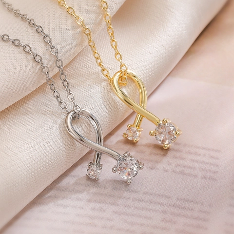Collana con Pendente a Nodo di Nastro in Rame e Zirconia Minimalista Collana a Girocollo Geometrica per Donna