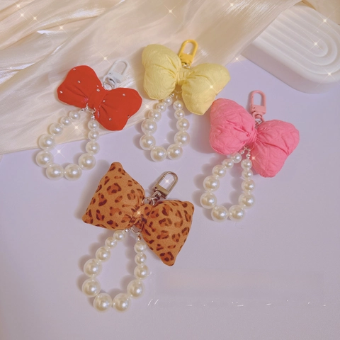 Lindo Llavero de Lazo de Tela y Perla Artificial para Mujeres Niñas Accesorio de Moda Adorno de Bolso con Estampado de Leopardo Colgante de Teléfono