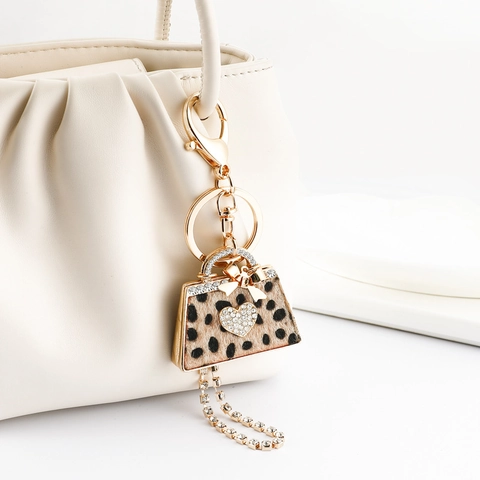 Portachiavi Borsa Stampa Leopardata Lega Di Zinco Strass Cuore Fiocco Lunga Catena Con Nappine Ciondolo Per Borsa Donna