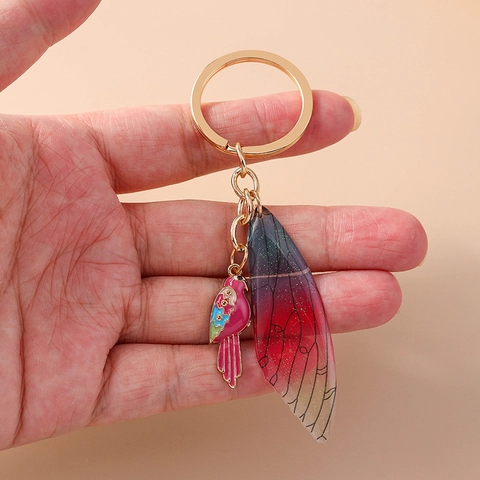 Portachiavi Ala Di Uccello Metallo Smalto Pappagallo Pendente Con Ala In Resina Sfumata Glitter Elegante Fascino Borsa