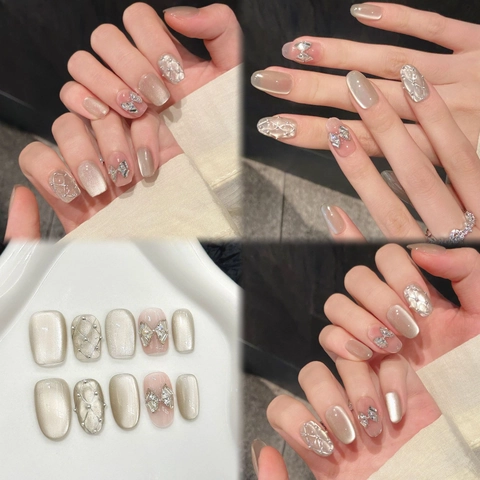Unghie Finte Fatte A Mano Champagne Argento Occhio Di Gatto Con Fiocco 3D E Strass Rombi Elegante Corto Manicure