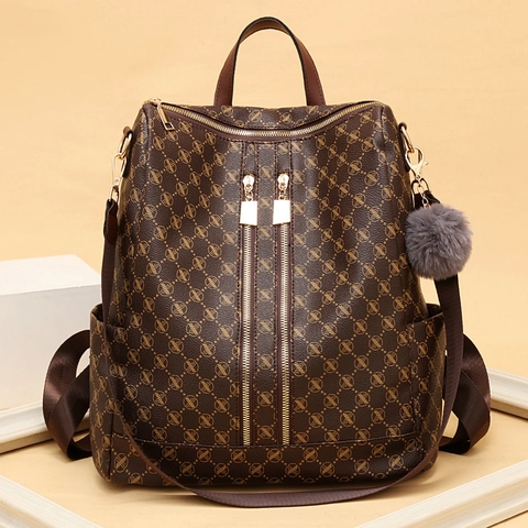 Sac À Dos Mode Femme Motif Monogramme Cuir Synthétique Antivol Voyage Avec Pendentif Boule De Fourrure Style Rétro