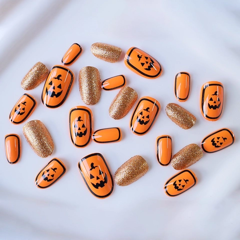 Halloween Press On Nails Kort Ovaal Oranje Pompoen Gezicht Goud Glitter ABS Kunststof Kunstnagels Voor Dames
