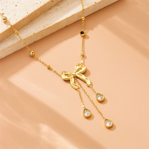 Elegant Gold Plated Stainless Steel Necklace With Stereoscopic Bowknot And Waterdrop Cubic Zirconia Tassel Pendant For Women