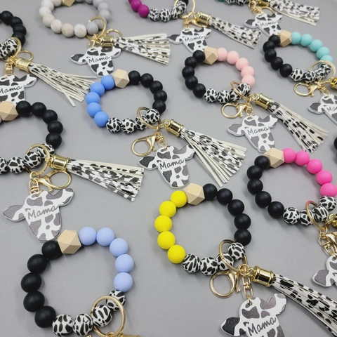 MAMA Cow Head Silicone Bead Keychain Bracelet Cow Print Tassel Wood Bead Wristlet Handmade Mother's Day Fashion Key Ring Jewelry