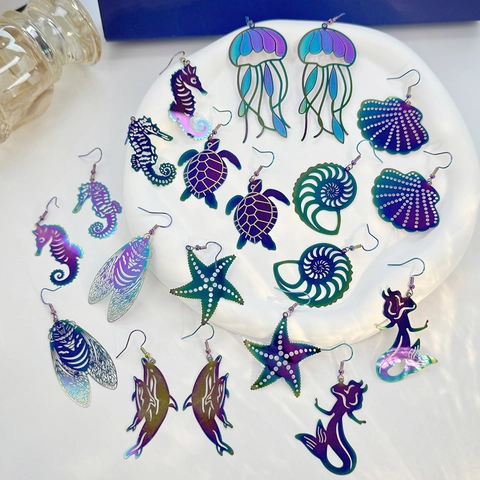 Boucles D'oreilles Pendantes Iridescentes Série Océan Acier Inoxydable Découpe Laser Animaux Marins Étoile De Mer Femme