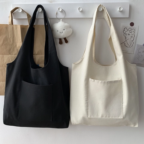 Bolso Tote De Lona En Blanco Gran Capacidad Color Sólido Bolsillo Delantero Minimalista Estilo Japonés Informal Viaje Bolso Hombro
