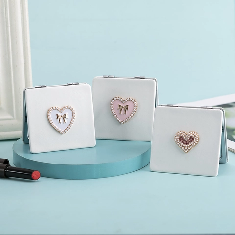 Specchio Da Trucco Portatile Pelle PU Doppia Faccia Specchio Tascabile Pieghevole Con Decorazione Perla Artificial Cuore Fiocco