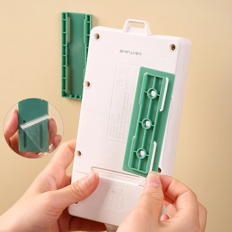 Selbstklebender Steckdosenleisten Fixierer Wandmontage Stanzfrei Steckdosenhalter Kunststoff Kabelorganisator