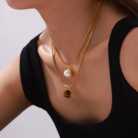 Collana a Spina di Pesce in Acciaio al Titanio Vintage per Donna Pendente Geometrico in Perla Artificiale e Pietra Occhio di Tigre