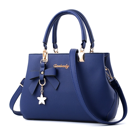 Sac à Main pour Femme en Cuir PU Texture Litchi Avec Nœud Papillon et Pendentif Étoile Sac à Bandoulière Vintage pour Usage Quotidien