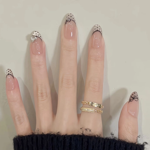 Unghie Finte Stile Francese Pois Neri Forma Mandorla Base Rosa Unghie Artificiali Con Fiocchi E Strass