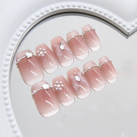 Uñas Postizas Hechas A Mano Rosa Degradado Efecto Ojo De Gato French Tip Con Mariposa Perla Artificial Estrella Rhinestone Uñas De Plástico ABS