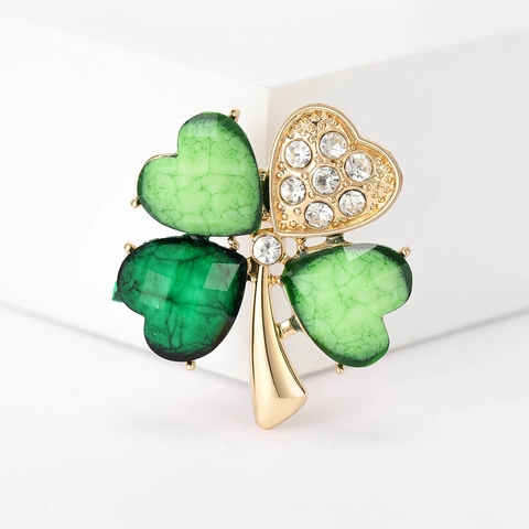 Exquise Broche Trèfle à Quatre Feuilles en Alliage avec Strass Plaqué Or avec Pierre Gemme d'Imitation Verte pour Accessoires de Vêtement pour Femmes