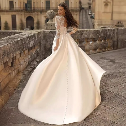 Elegante Trouwjurk Met Lange Mouwen Kant Satijn A-Lijn Bruidsjurk Rugloos Vloerlengte Ivoor Wit Vintage Dames