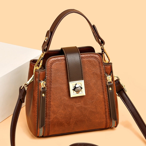 Women Retro Bucket Bag PU Leather Handbag With Gold Lock And Detachable Shoulder Strap Contrast Color Crossbody Bag