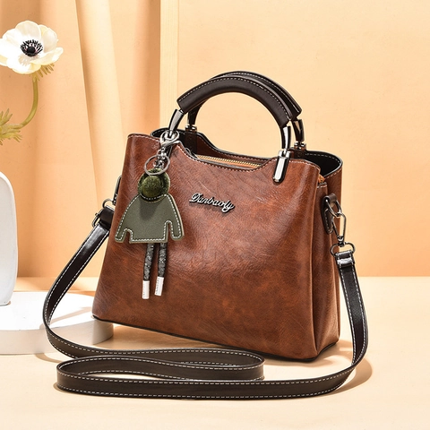 Retro PU Leather Shoulder Handbag For Women Large Capacity Crossbody Bag With Doll Pendant Textured Vintage Style