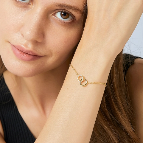 Bracelet Minimaliste en Cuivre à Double Anneaux Entrelacés pour Femmes Élégant Plaqué Or Strass Bijoux de Mode Géométriques Bracelet à Chaîne Réglable