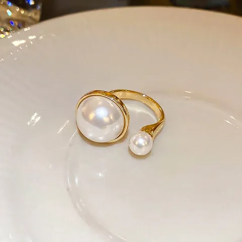 Bague Ouverte Imitation Künstliche Perle Irrégulière Cuivre Plaqué Or Argent Style Français Élégant Bijoux De Doigt Ajustables Femmes