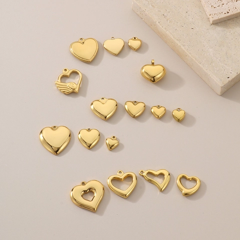 Ciondoli Cuore Acciaio Inossidabile Placcato Oro Gioielli Fai Da Te Charms Cuore Cavo Design Ala Per Collane Bracciali