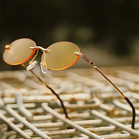 Randlose Ovale Sonnenbrille Retro Punk Metallrahmen UV400 Schutz Mode Brillen Accessoires Für Damen Herren