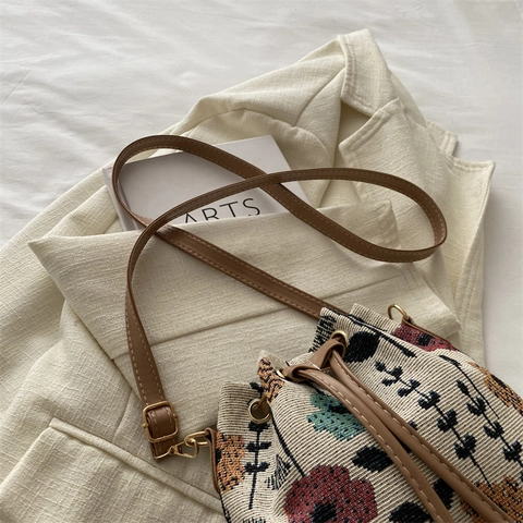Damen Ethno Gewebte Beuteltasche Vintage Blumen Geometrisches Muster Kordelzug Leinwand PU Leder Verstellbarer Schultergurt