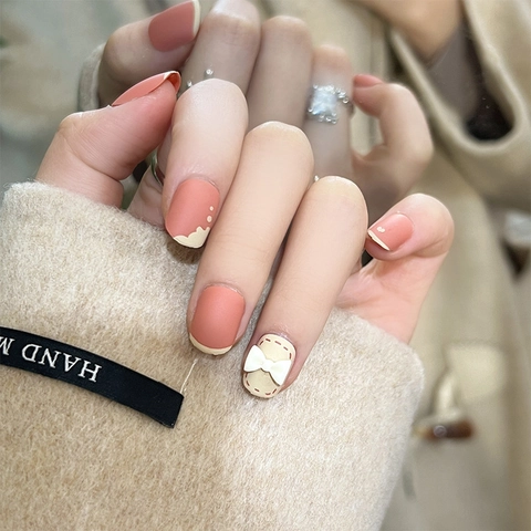 Uñas Postizas Mates Con Lazo Blanco 3D Color Empalmado Naranja Coral Beige Dulces Uñas Artificiales Redondas Cortas