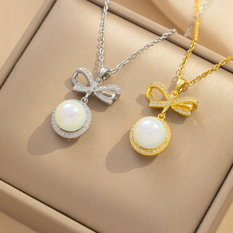 Collana Con Pendente A Fiocco E Perla Artificial Acciaio Al Titanio Gioielli Eleganti Per Donna