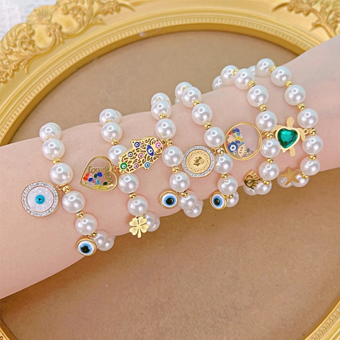 Bracciale Con Künstliche Perle Di Imitazione Boho Con Ciondoli In Acciaio Inossidabile Occhio Di Allah Hamsa Cuore E Tartaruga Donna