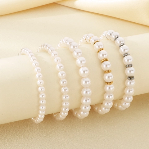 Elegante Bracciale Elastico Con Künstliche Perle Di Vetro Bianche E Distanziatori In Acciaio Inossidabile Gioielli Da Donna