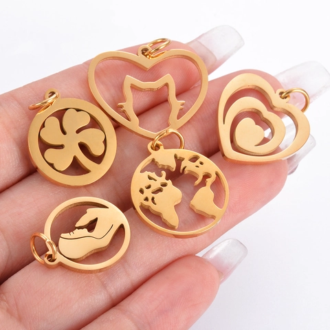 Dijes Colgantes Huecos De Acero Inoxidable Para Hacer Joyas DIY Mapa Del Mundo Corazón Trébol Gato Virgen María Diseños