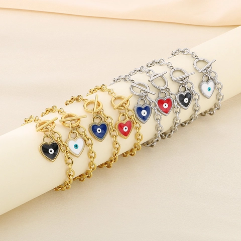 Bracciale A Catena In Acciaio Inossidabile Con Pendente Cuore Malocchio In Smalto E Chiusura A T Bar Gioielli