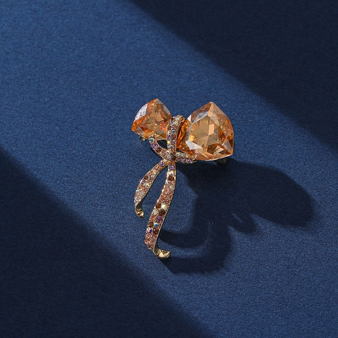 Elegant Bowknot Brooch Pin For Women With Large Amber Crystal And Multifaceted Multi Color Rhinestone Vintage Alloy Corsage