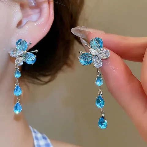 Orecchini Pendenti Con Nappine A Farfalla Con Zircone A Goccia D'acqua Blu E Perno In Argento Per Donna Gioielli