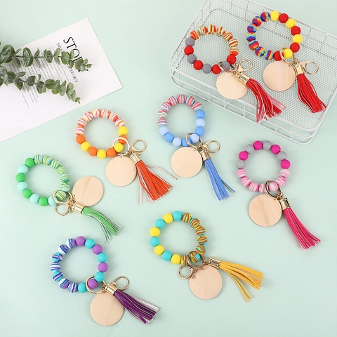 Porte-clés de Poignet en Perles de Silicone Bracelet Perlé Anneau avec Disque en Bois Gland en PU Support de Clé Femme