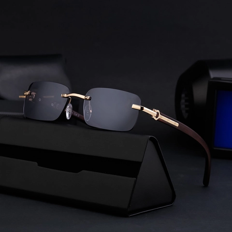 Occhiali Da Sole Quadrati Senza Montatura Uomo Donna Retrò Stanghette Trama Legno Cerniera Metallo Lenti Sfumate UV400 Moda Lusso