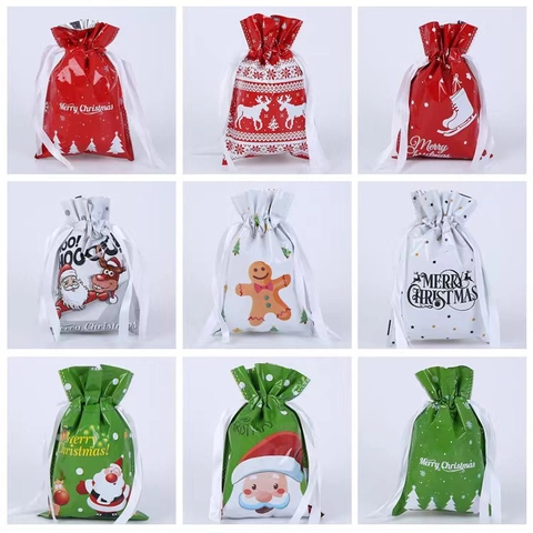 Sacchetti Regalo Di Natale Con Coulisse In Plastica Chiusura A Nastro Per Festa Di Vacanza Caramelle Motivi Babbo Natale