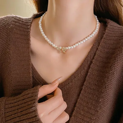 Künstliche Perlenkette Mit Strass Besetztem Legierungsschleifen Anhänger Elegante Modeschmuck Schlüsselbeinkette Für Damen