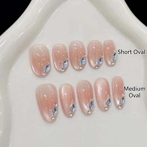 Unghie Finte Press On Fatte A Mano Rosa Nude Occhio Di Gatto Con Strass Blu Eleganti Mandorla Ovali Artificiali