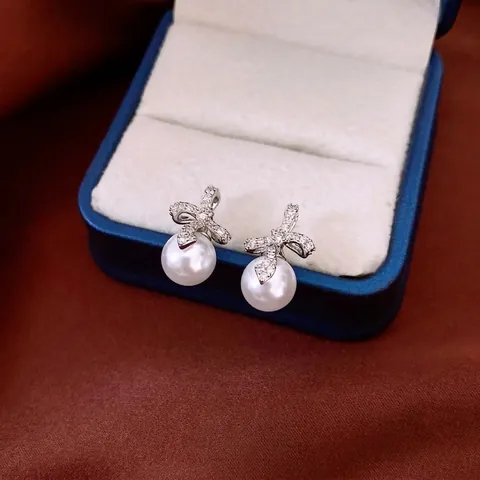 Orecchini Pendenti A Fiocco Con Zirconi Perla Artificial Sintetica E Perno In Argento Stile Elegante Chic Gioielli