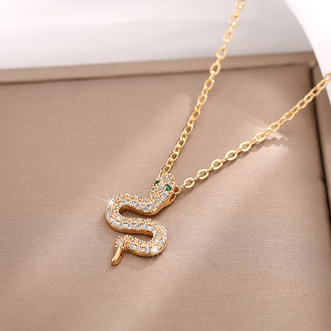 Snake Pendant Necklace Gold Plated Copper With Zircon Inlay And Green Gemstone Eyes Sparkling Animal Jewelry For Women
