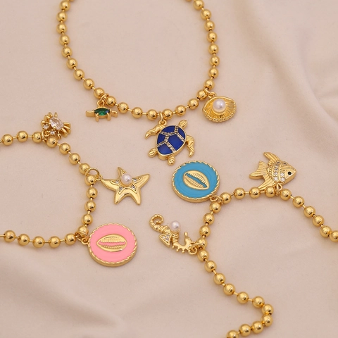 Bracciali Con Ciondoli Tema Oceano Per Donne Rame Placcato Oro 18K Smalto Tartaruga Marina Stella Marina Conchiglia Perla Artificial Gioielli