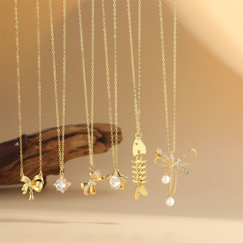 Collier Pendentif en Cuivre Plaqué Or 14K Zirconia pour Femme Forme Nœud Papillon Arête de Poisson Étoile Chaîne O Bijoux Minimalistes