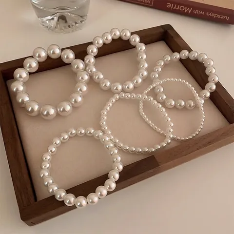 Elegantes Französisches Retro Weißes Künstliche Perlenarmband Elastisch Einfach Minimalistisch Mode Schmuck Zubehör Für Frauen Mädchen