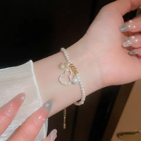 Elegante Bracciale Di Künstliche Perle Per Donna Con Ciondolo A Zucca Svuotato Intarsiato In Zircone Stile Francese Lusso Leggero